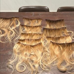 Two packs platform hair extensions. 22” trimmed to 20” and rooted.